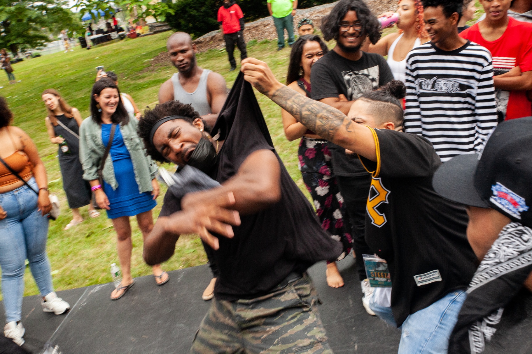 Dancer mid-move with the crowd cheering at Steez 2021